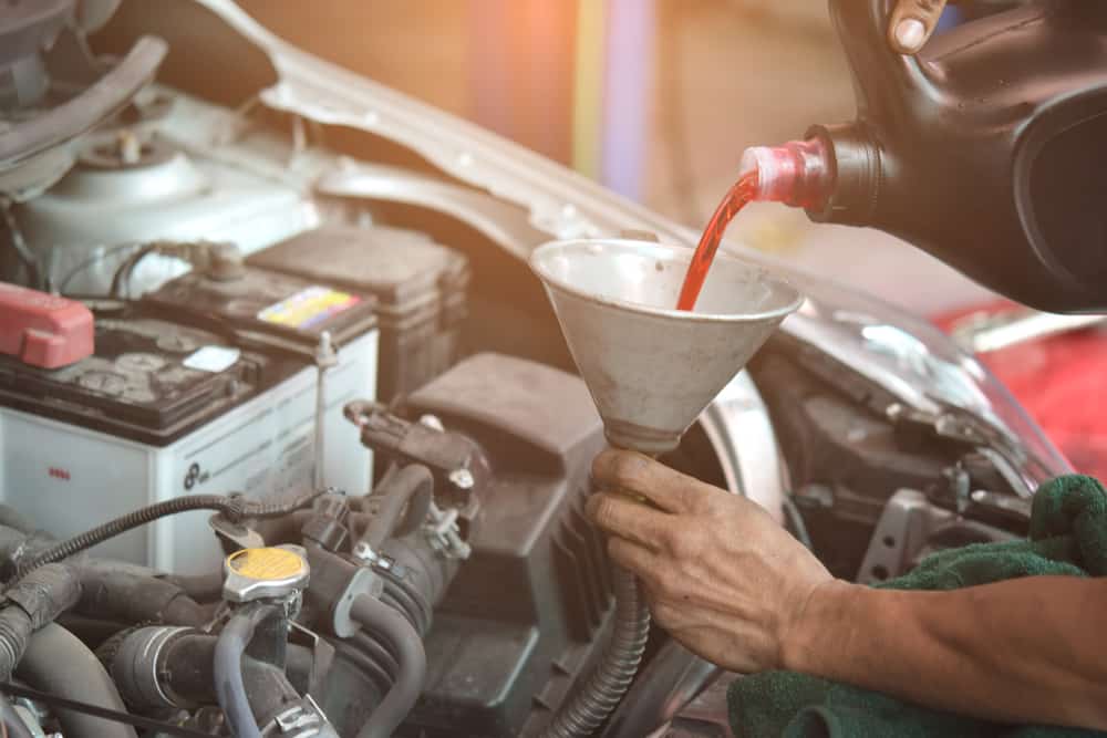 6 Symptoms of Low Transmission Fluid, How to Check &  Costs